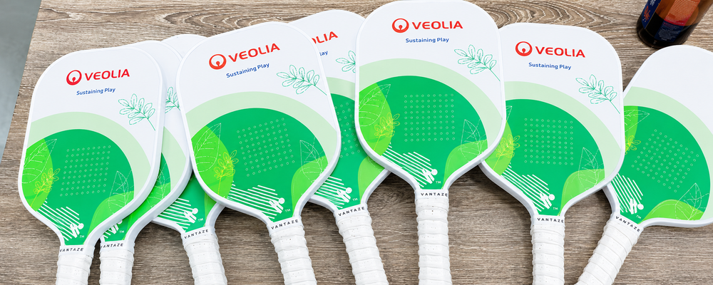 Custom Veolia pickleball paddle made by Vantaze for a corporate sustainability brand project